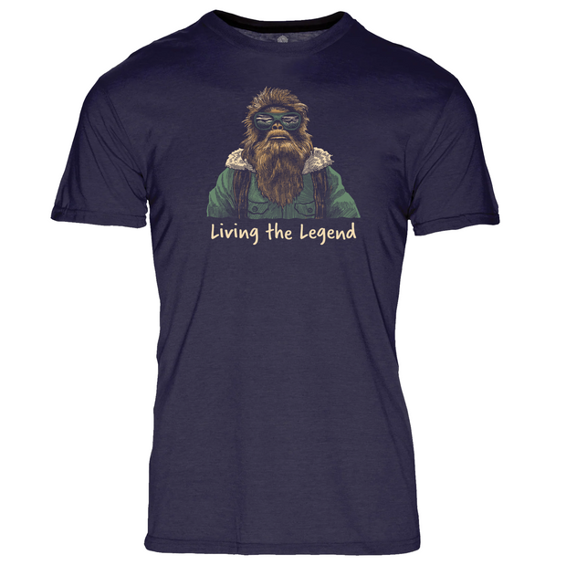 Navy blue t-shirt with a graphic of a bearded bigfoot and 'Living the Legend' text on a white background